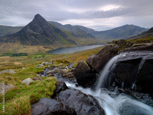 Tryfan in spring with the Afon Lloer in flow over the waterfalls, Wales.