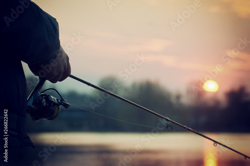 Fototapeta Fishing rod spinning close up