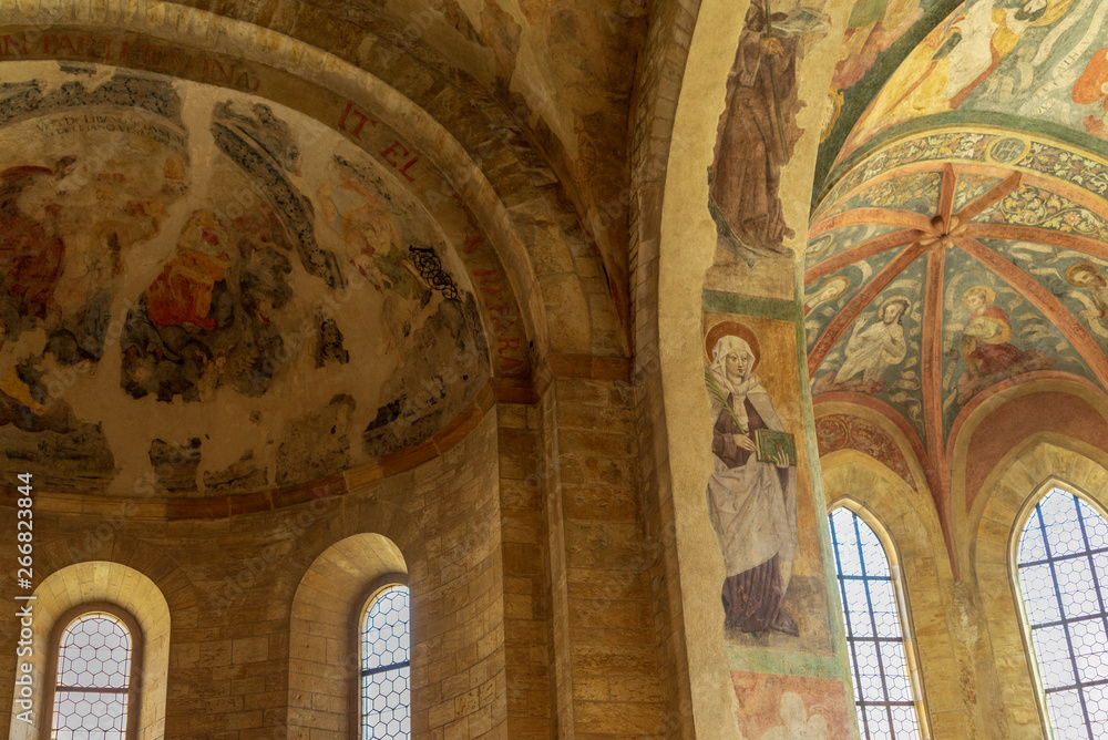 Interior view of existing old stucco ancient painting on ceiling and wall inside St. George's Basilica at Prague Castle. 