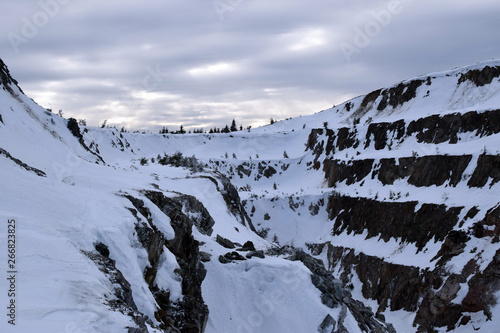 Fototapeta Naklejka Na Ścianę i Meble -  Old abandoned quartz mines in Jizera Mountains. Winter landscape in Sudetes Mountains.
