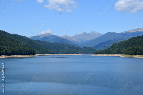 Landscape of Lake Vidraru (Lacul Vidraru). View from Vidraru dam in Fagaras Mountains. Transfagarasan road, Romania.