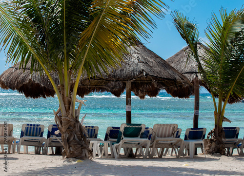 Fototapeta Naklejka Na Ścianę i Meble -  Tiki Chairs on the Beach 