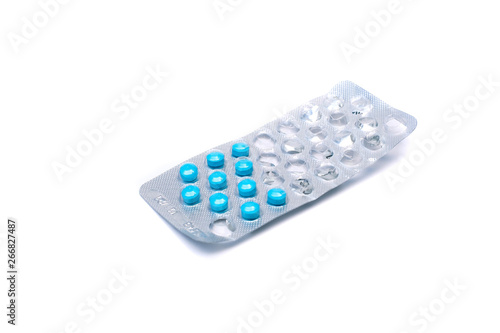 blue pills in open blister, drugs