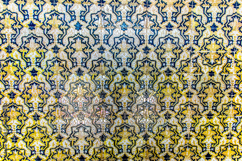 A hand painted and crafted ceramic tile wall pattern from the Plaza de Espana in Sevilla/Seville Spain.
