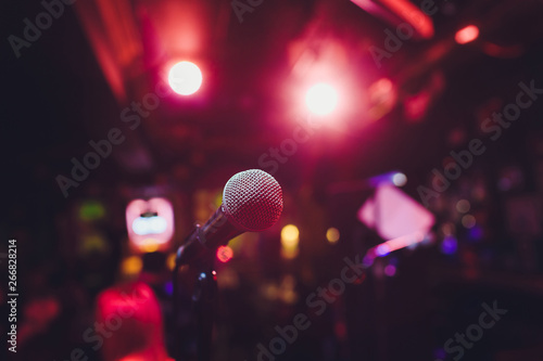 Microphone on stage against a background of auditorium. Fototapet