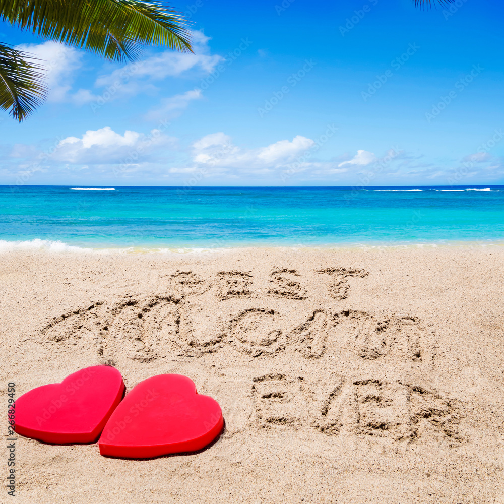 Happy Mother's day lettering background on the beach Happy Mother's day lettering background on the beach