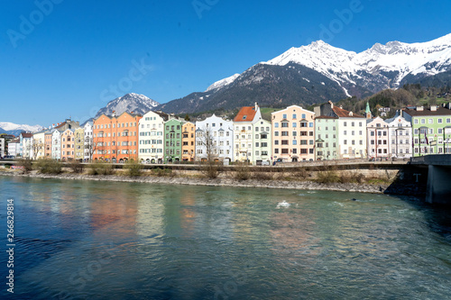 Innsbruck, Tyrol, Austria. Colored houses on the Inn River in Innsbruck. Colored houses in Innsbruck.