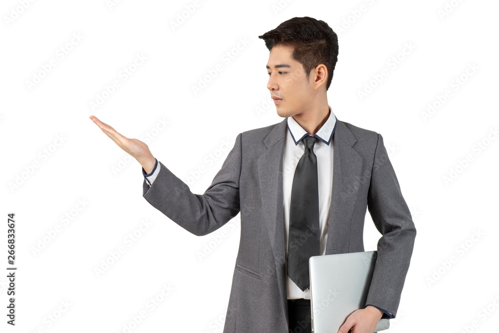 Happy young businessman looking hand and hold laptop in suit on white background, isolated concept Happy young businessman looking hand and hold laptop in suit on white background, isolated concept