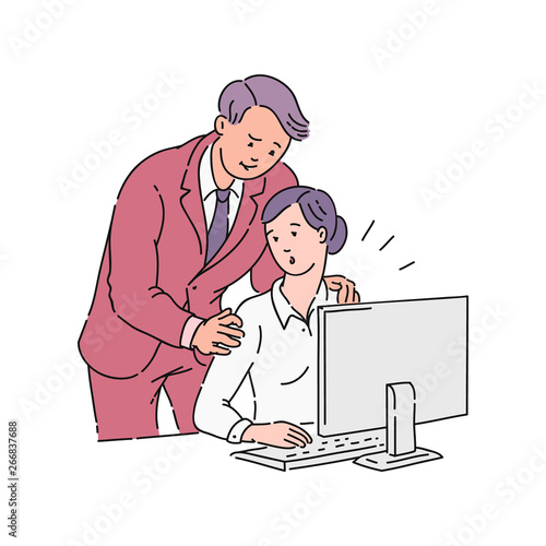 A male colleague or boss puts his hands on the shoulders of a young girl in the workplace.