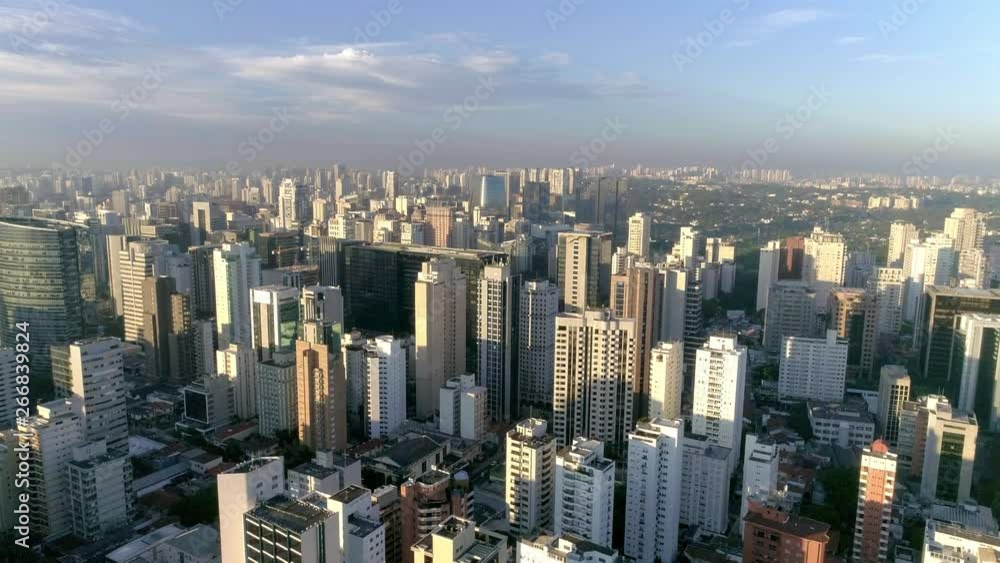 4k Aerial shot of São Paulo financial center before sunset with the city skyline and blue sky 4k Aerial shot of São Paulo financial center before sunset with the city skyline and blue sky