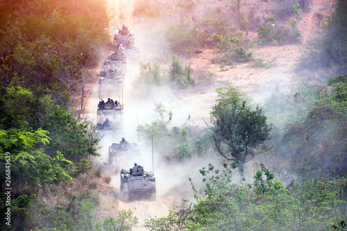 Photo Backside of  Soldier army operation, Grunge style image of modern armored tanks
