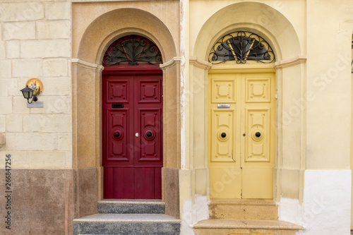 twin  old wooden door different colour Malta