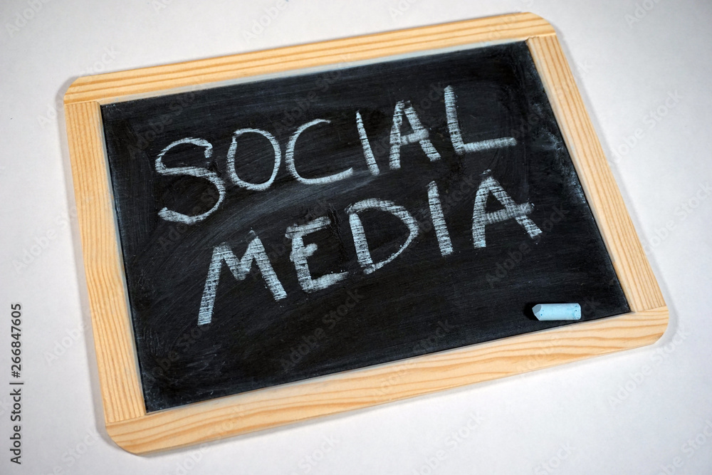 Social media message on chalkboard Social media message on chalkboard