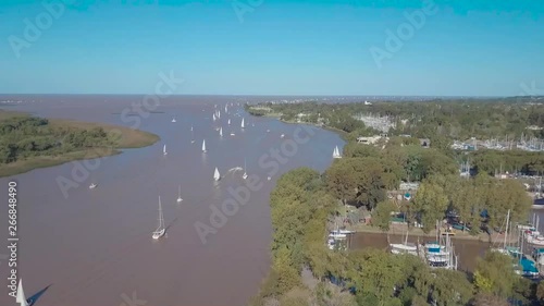 Aerial view of the Rio de la Plata, Buenos Aires, Argentina. The river Lujan is full of sailboats enjoying the sunset photo
