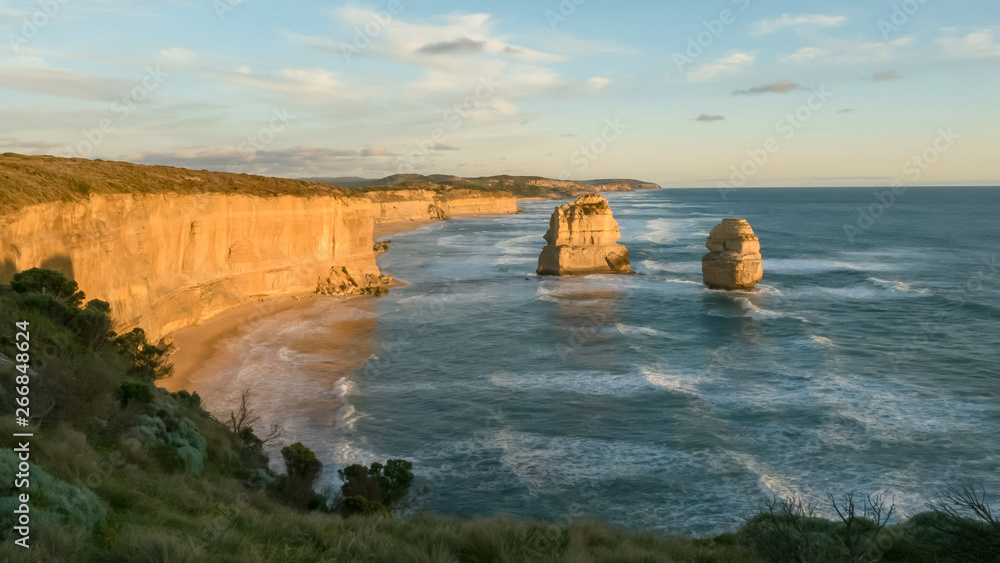 sun setting at the twelve apostles on the great ocean road sun setting at the twelve apostles on the great ocean road