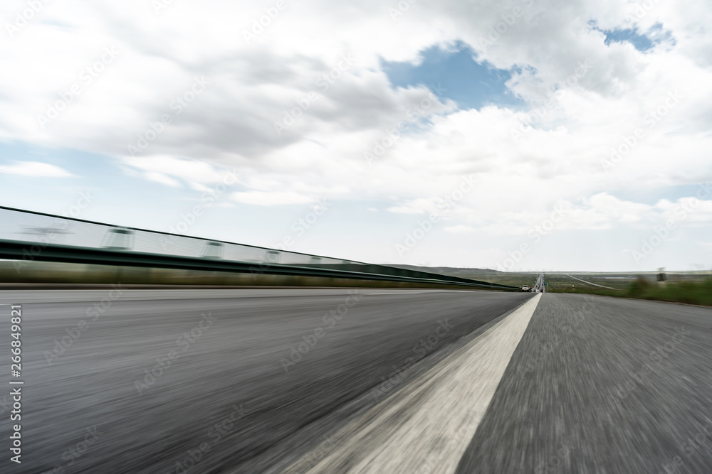 Fototapeta premium A fast road under a clear sky