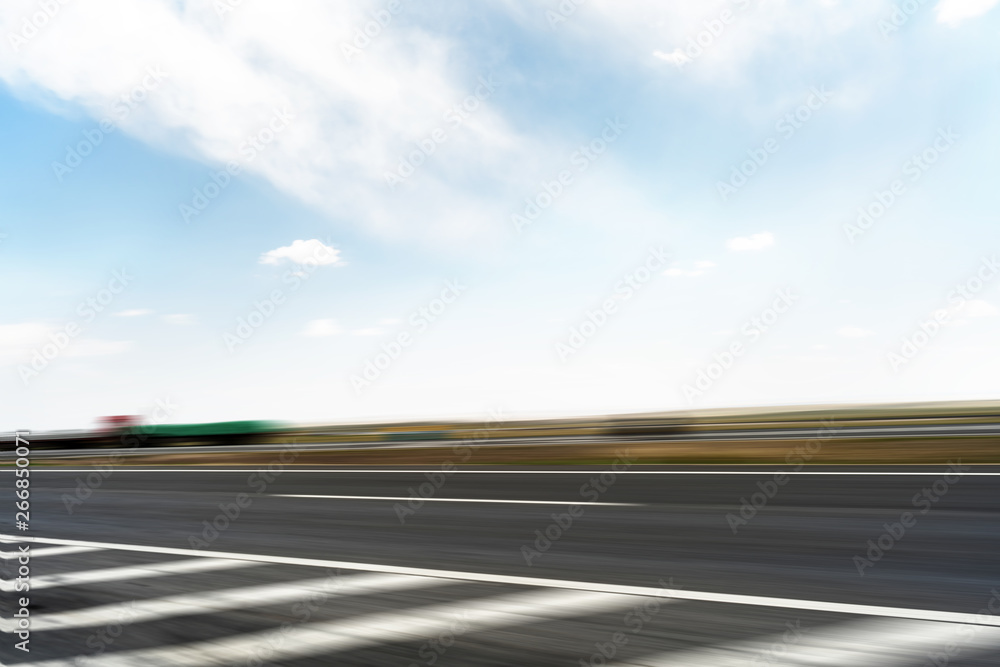 Fototapeta premium A fast road under a clear sky