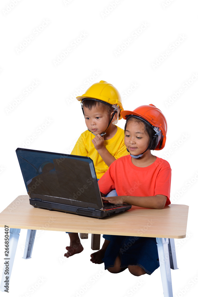 Asian children wearing safety helmet and thinking planer isolated on white background. Kids and education concept Asian children wearing safety helmet and thinking planer isolated on white background. Kids and education concept