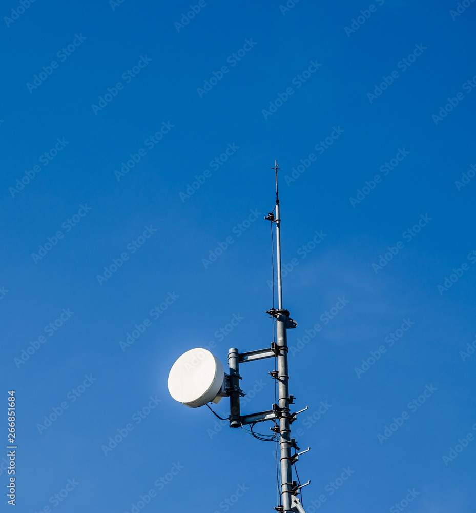 Telecommunication pole over the clouds Telecommunication pole over the clouds