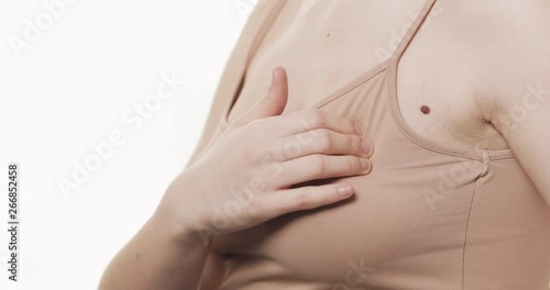 Wallpaper Mural Woman checking her breast for signs of breast cancer. Healthcare and mammology concept. Close up. Torontodigital.ca