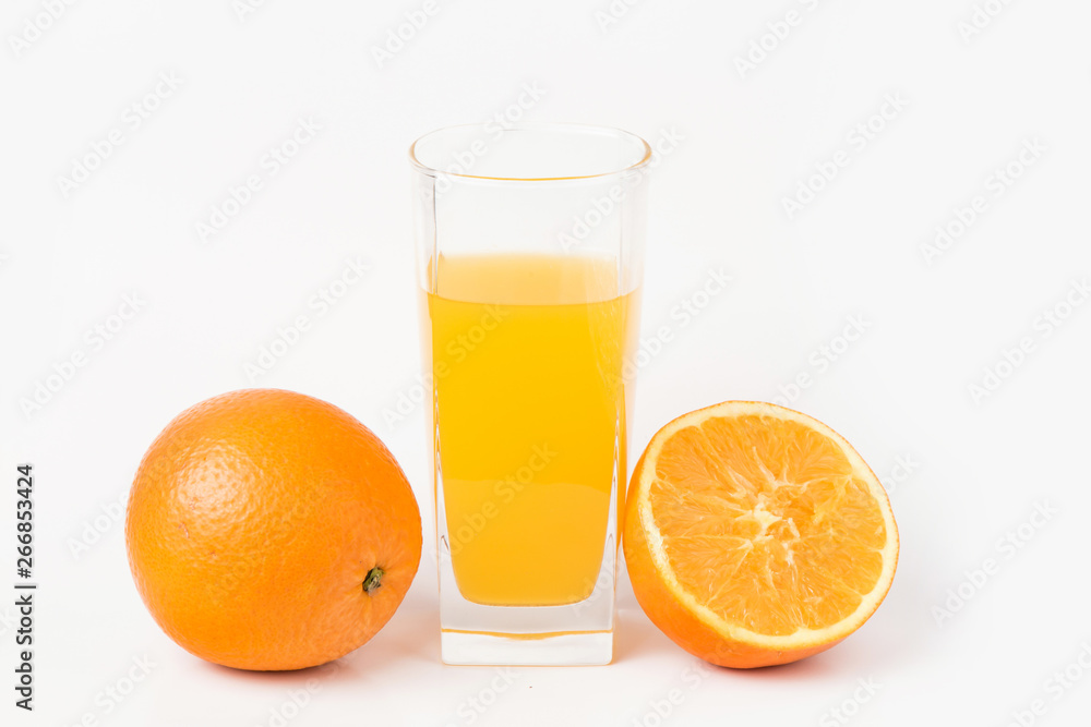 Oranges and orange juice on a white background Oranges and orange juice on a white background