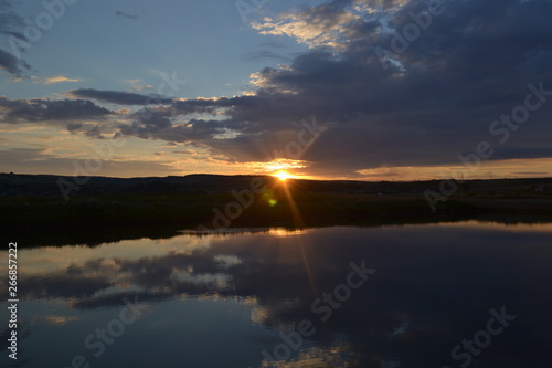 sunset with clouds on the lake