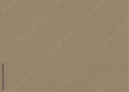 Corrugated colored cardboard brown beige olive vintage color. Textural paper cardboard background for design.