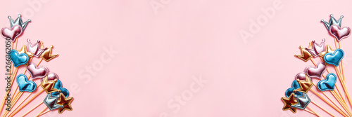 Collection of party objects on pink background. Birthday concept. Top view, banner