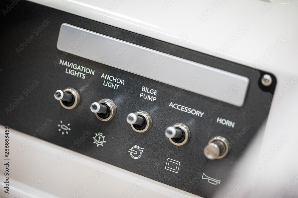 Control panel with switches in a luxury speed boat Control panel with switches in a luxury speed boat
