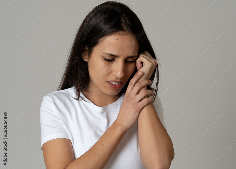 Portrait of sad and depressed woman. Isolated on neutral background. Human expressions and emotions Portrait of sad and depressed woman. Isolated on neutral background. Human expressions and emotions
