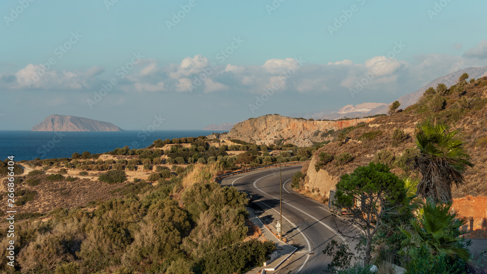 Greece, Crete. Landscape, sea, sunset, mountains, sun.