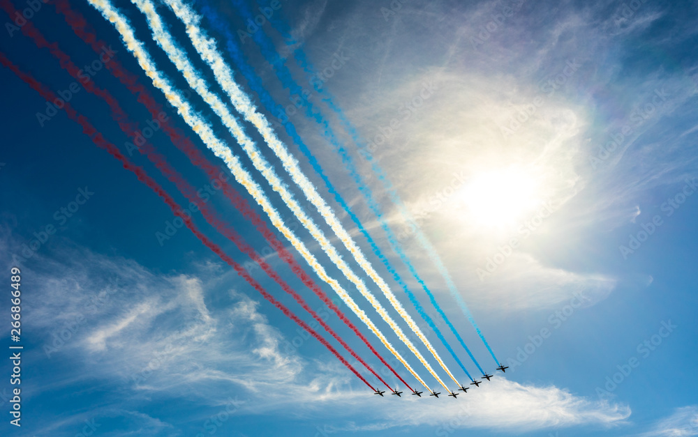 Flying several planes in the blue sky, Bastille Day. France flag - obrazy, fototapety, plakaty 