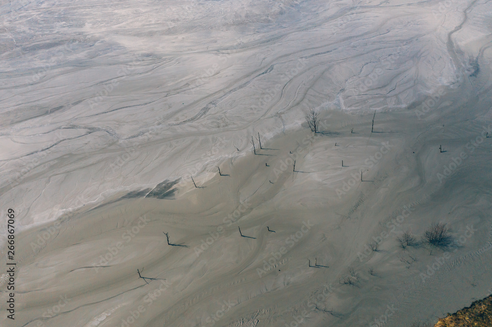 Fototapeta premium Drone view of contaminated, toxic water stream in Geamana, Romania