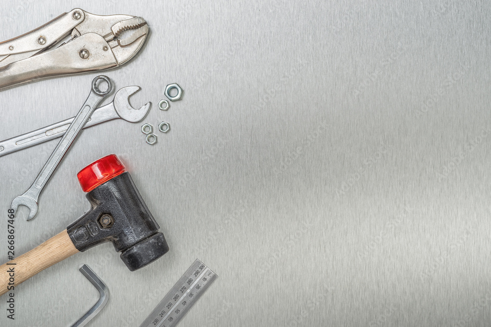 Tools on a metal background with copy space Tools on a metal background with copy space