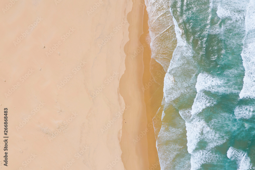 Atlantic ocean sandy beach with turquoise ocean and waves. Aerial view Atlantic ocean sandy beach with turquoise ocean and waves. Aerial view