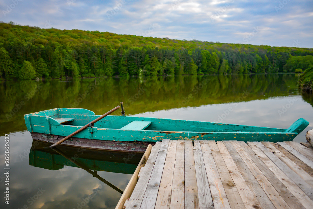 Beautiful old boat on the lake Beautiful old boat on the lake