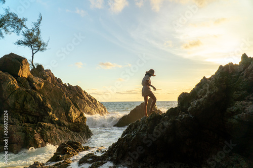 Alone Travel girl on beach sunset