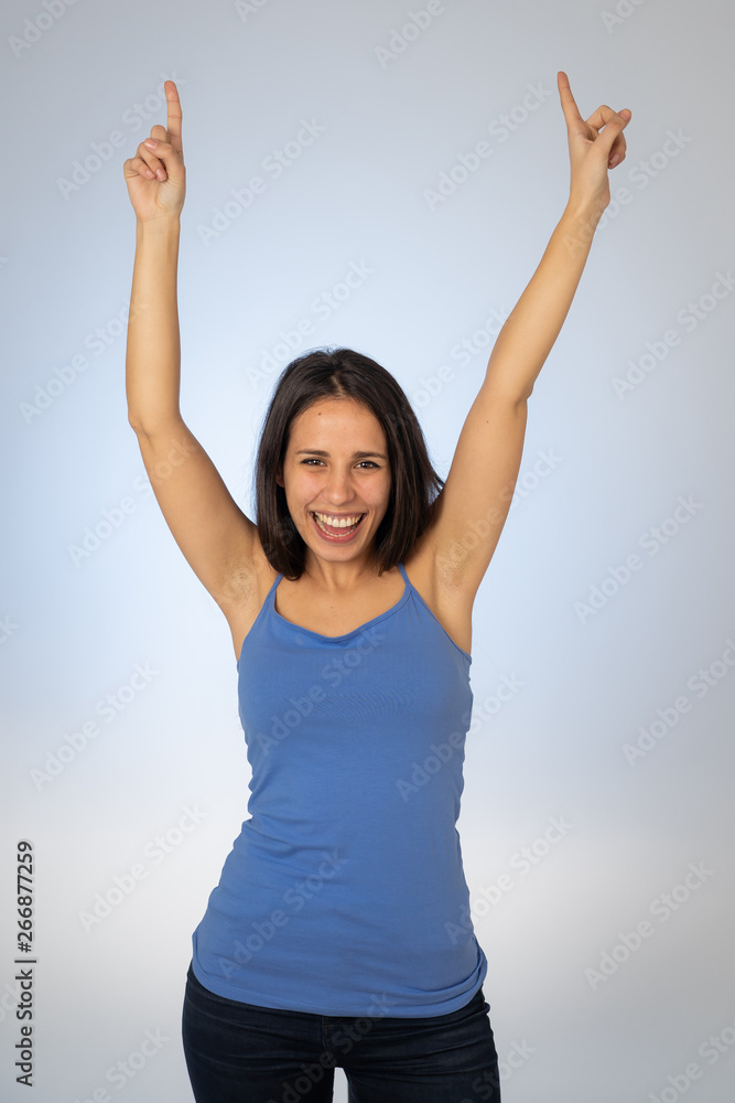 Cute beautiful teenager girl dancing feeling happy celebrating success or winning