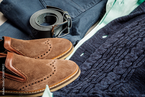 casual men fashion set: jacket, shirt, jeans, belt, shoes sweater