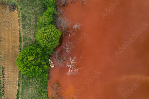 Drone view of contaminated, toxic water stream in Geamana, Romania photo