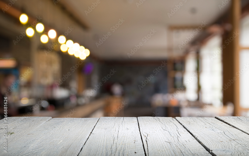 custom made wallpaper toronto digitalimage of wooden table in front of abstract blurred background of resturant lights