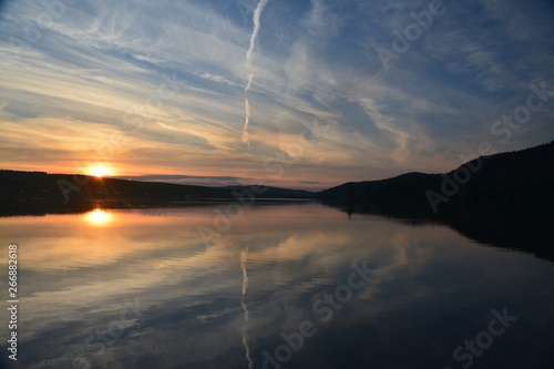 a beautiful sunset on the lake 