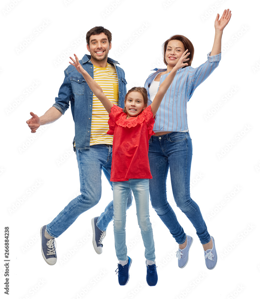 family, motion and people concept - happy smiling mother, father and little daughter jumping over white background family, motion and people concept - happy smiling mother, father and little daughter jumping over white background