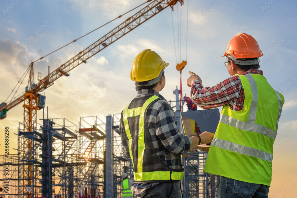 Construction engineer at construction site Construction engineer at construction site