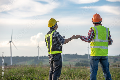 engineer with wind generators power plant construction site