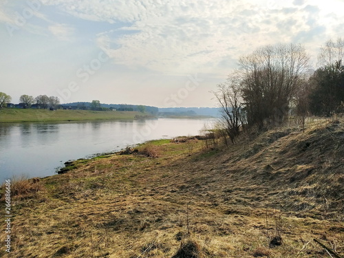 Spring sunny morning on the river bank