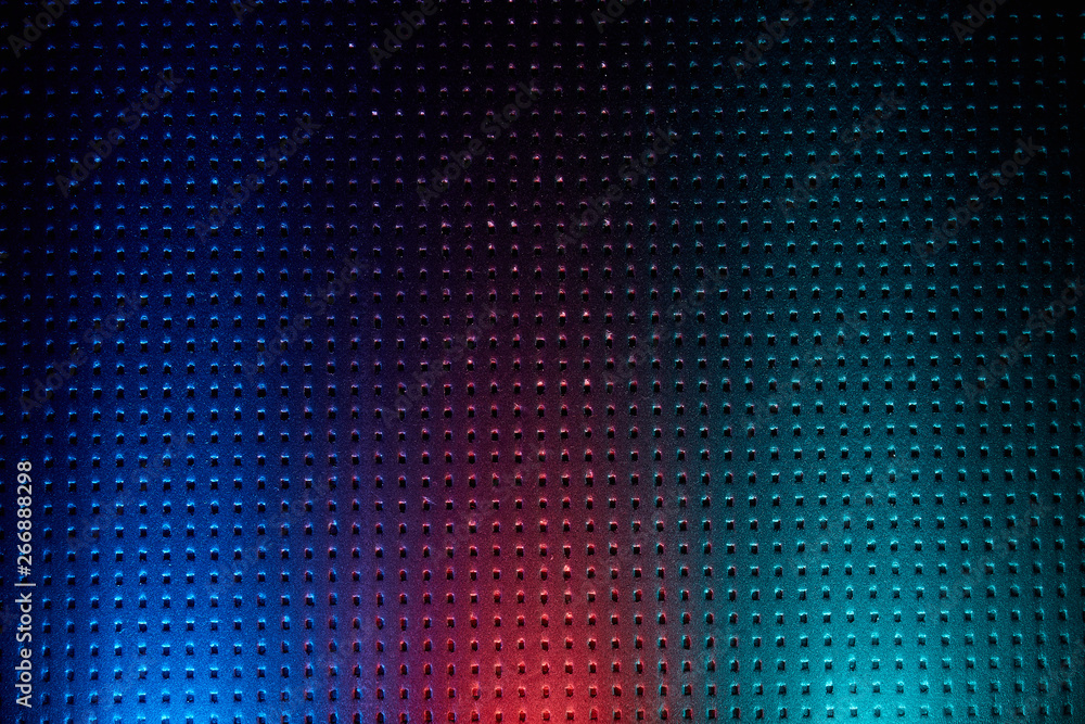 Vertical stripes of light in blue and red Vertical stripes of light in blue and red