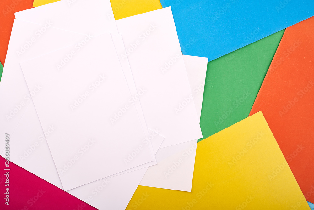 White papers for text on the background with colored cardboards. Preschool craft kids concept White papers for text on the background with colored cardboards. Preschool craft kids concept