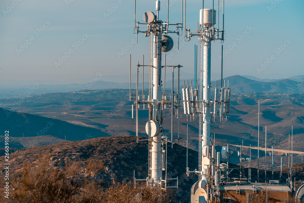 Wireless communication concept. Radio antennas, transmitters on top of hill