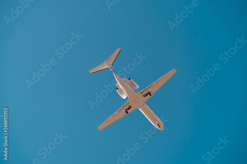 Airliner in blue sky. Travel, air transportation concept